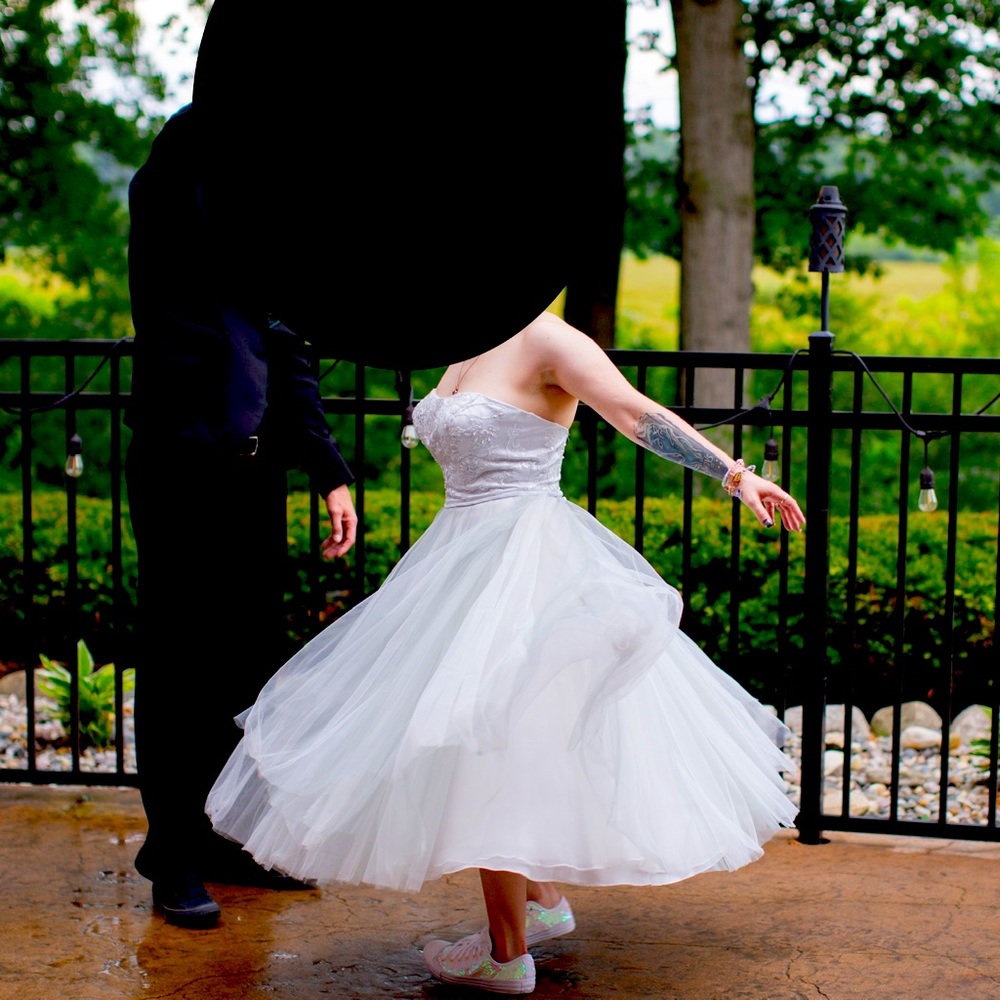 Dress from David’s Bridal. Color is very light silver.